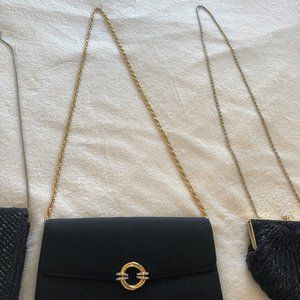 Used but in great condition shoulder strap evening bags